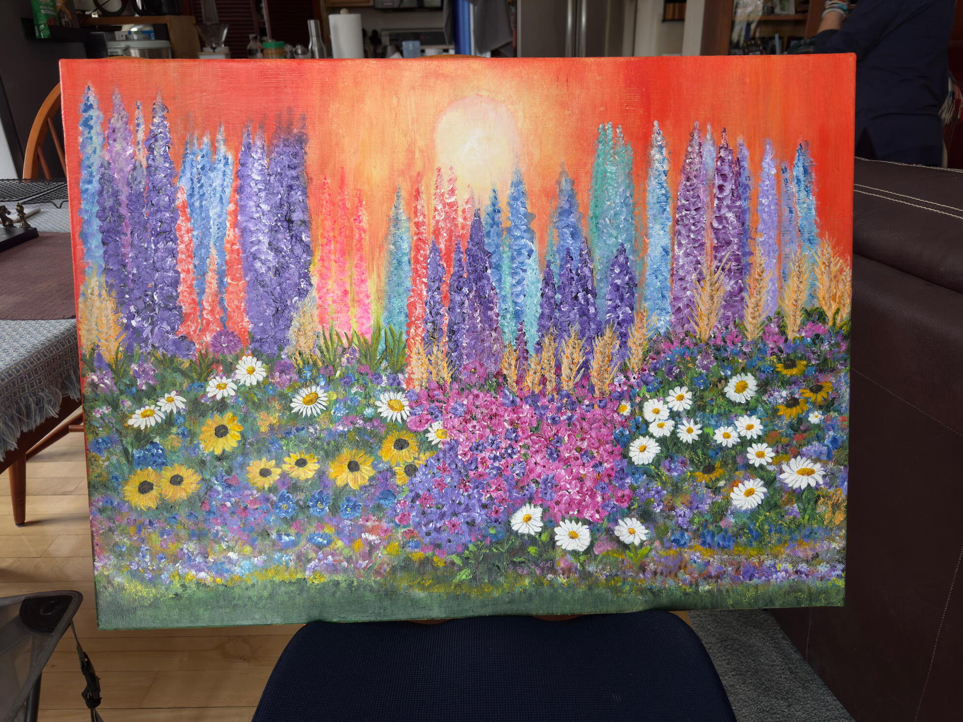 Veronica de Saint Phalle wearing her hand made tatted earrings at her studio in Johnson Vermont